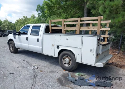 2009 Ford F350 Super Duty из США, поврежденный, VIN 1FDSW30589EA60883